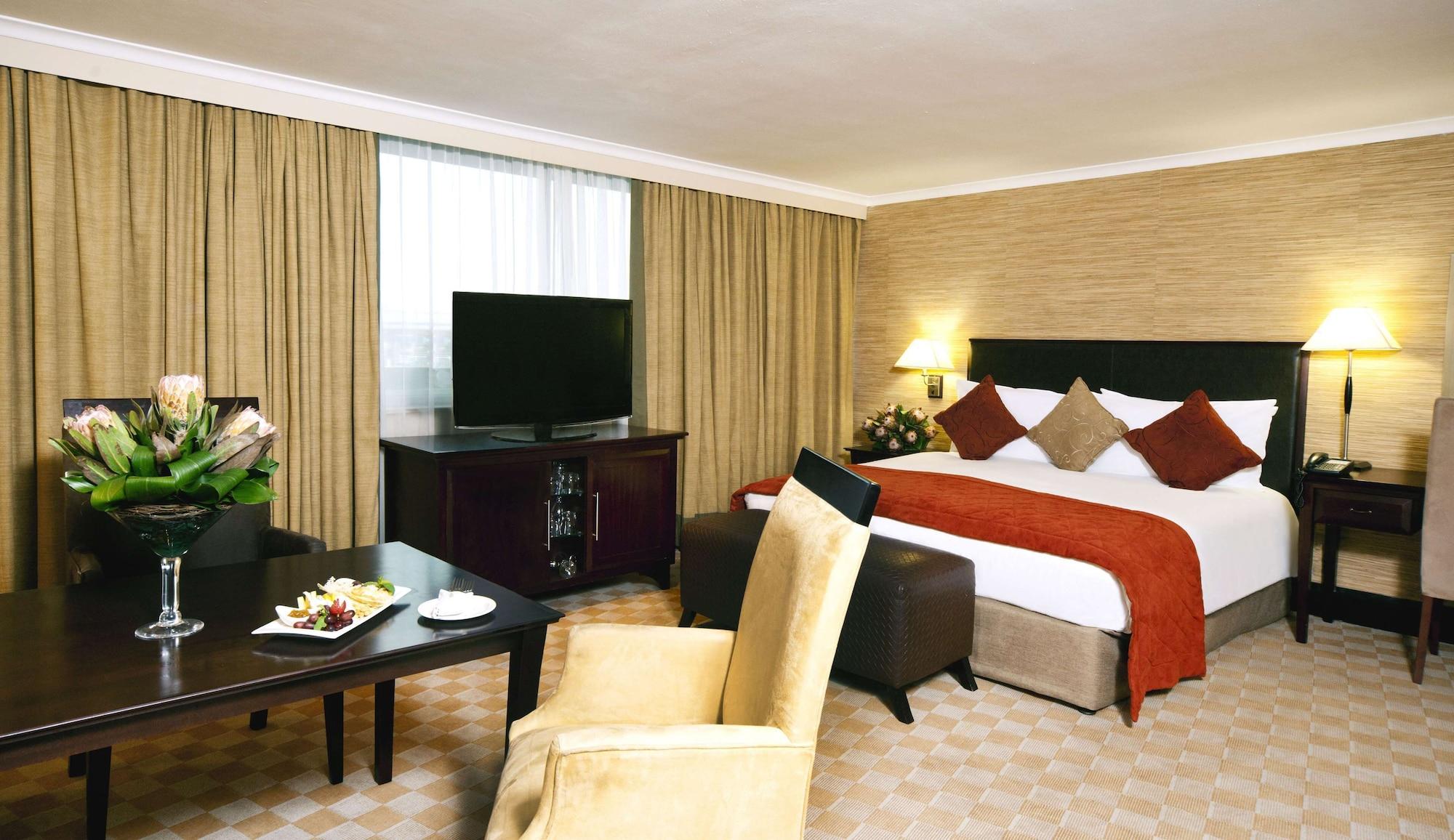 Southern Sun Or Tambo International Airport Hotel Kempton Park Buitenkant foto A room at the hotel