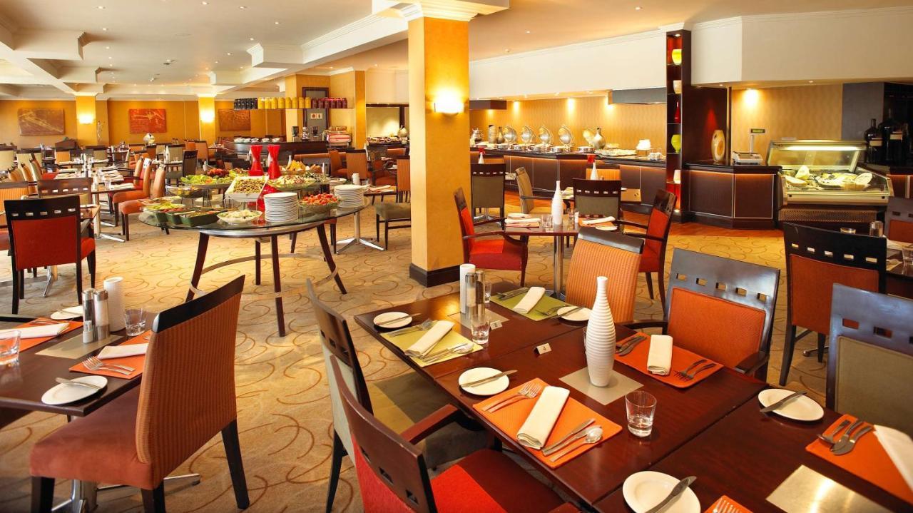 Southern Sun Or Tambo International Airport Kempton Park Buitenkant foto A restaurant in Johannesburg, South Africa